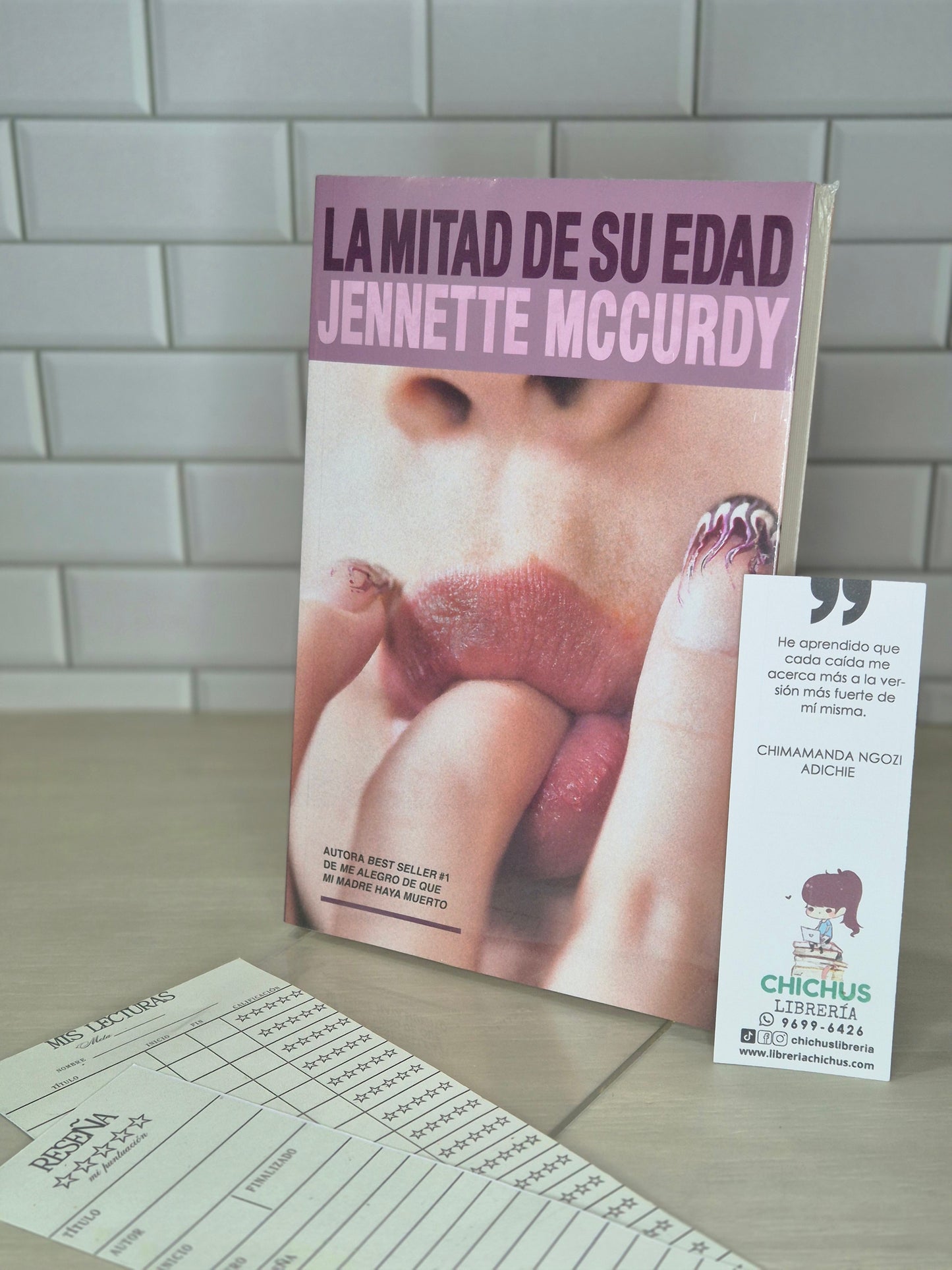 La mitad de su edad