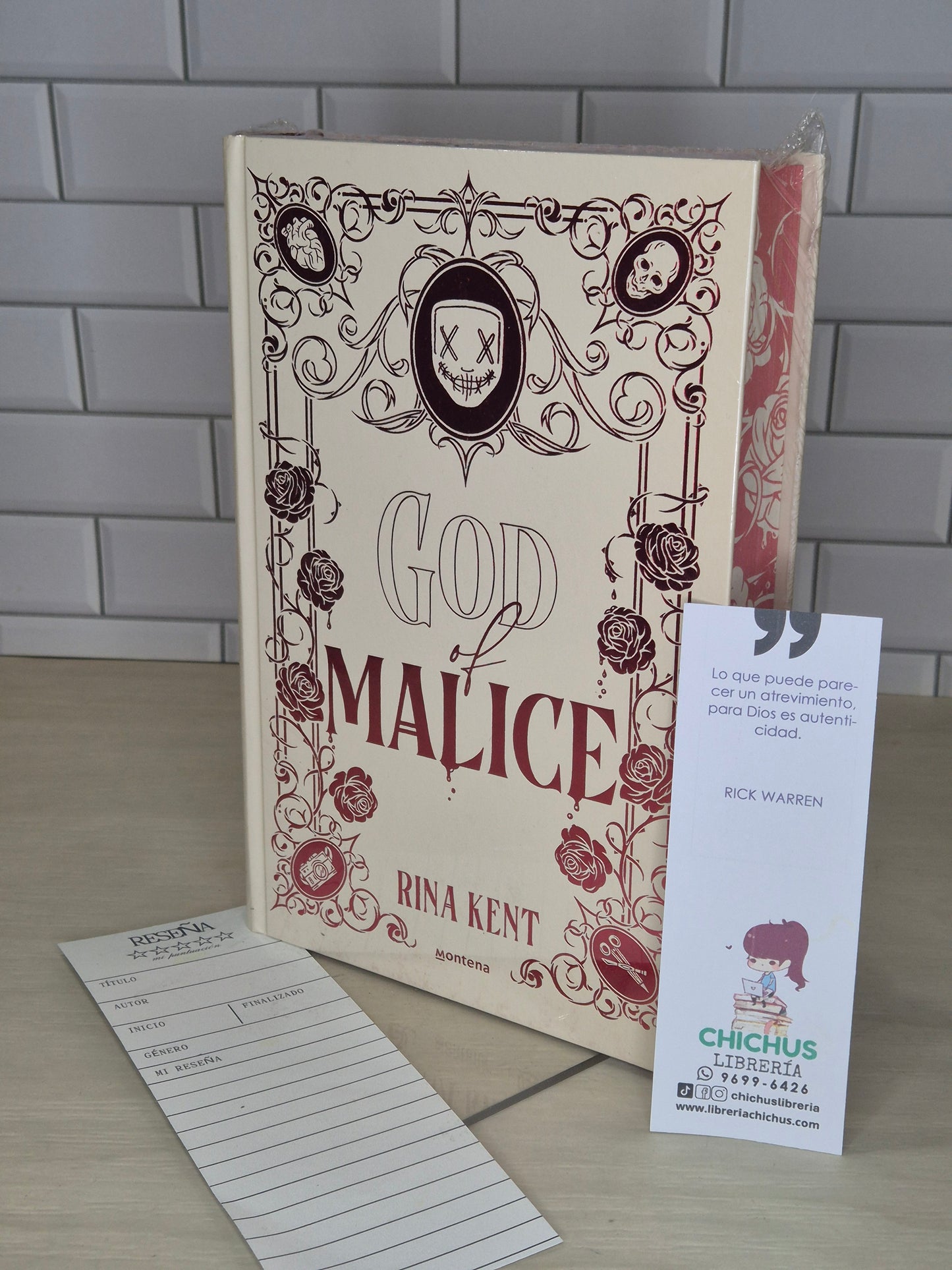 God of Malice edición especial con cantos pintados en tapa dura